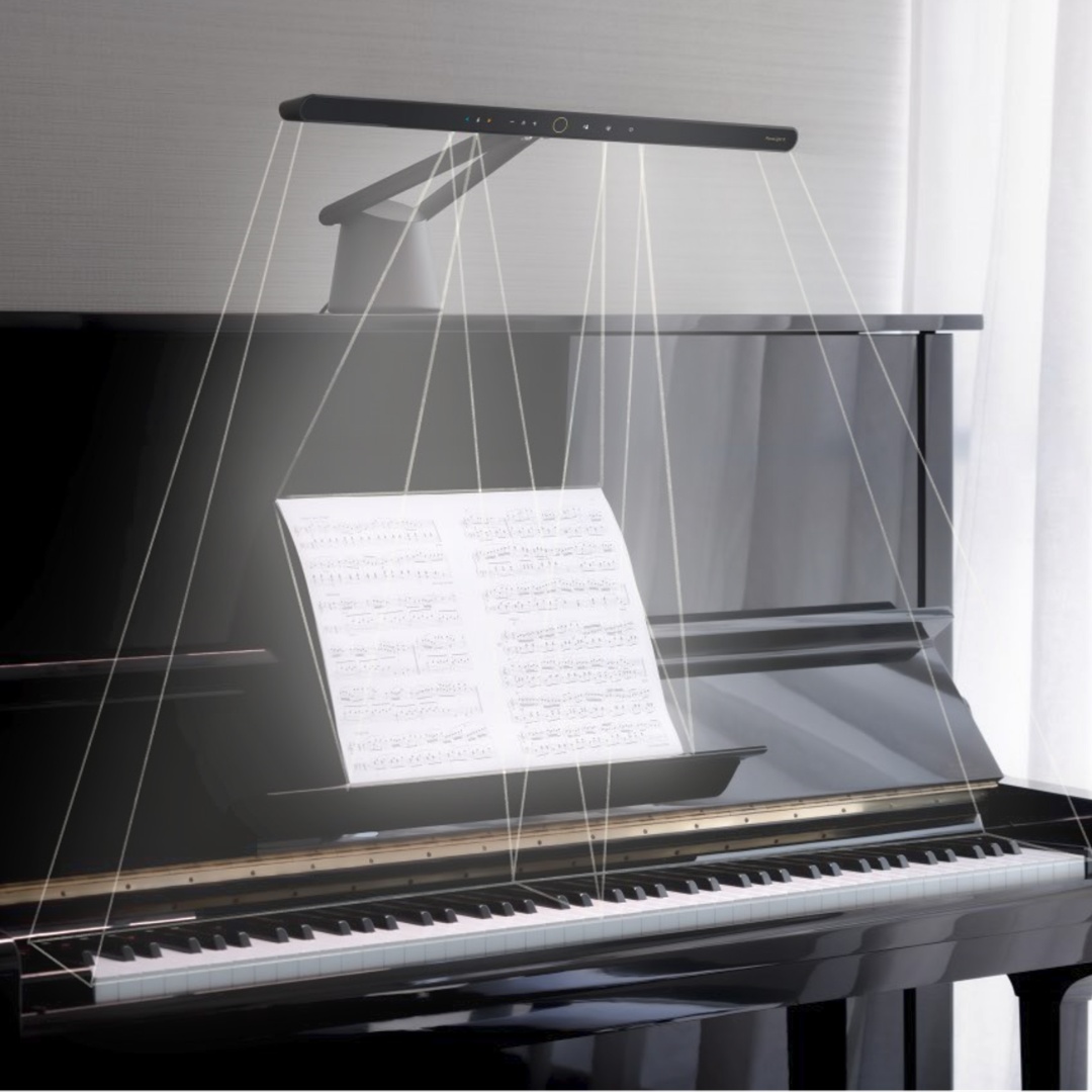 benq pianolight utilizes an exclusive optical design to evenly lights up both sheet music and keys