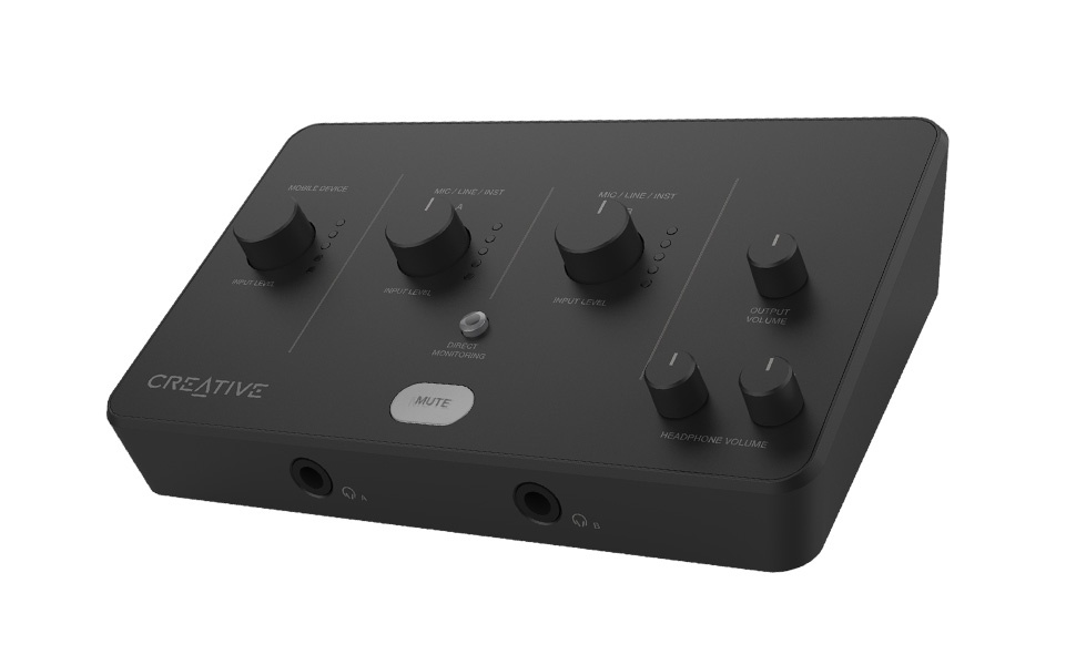 Creative-branded black audio control interface with multiple adjustment knobs and input/output ports, featuring a compact desktop design.