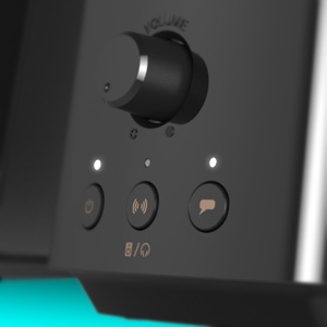 close up of creative T60 with buttons to Clear Dialog and Surround features to turn them on/off