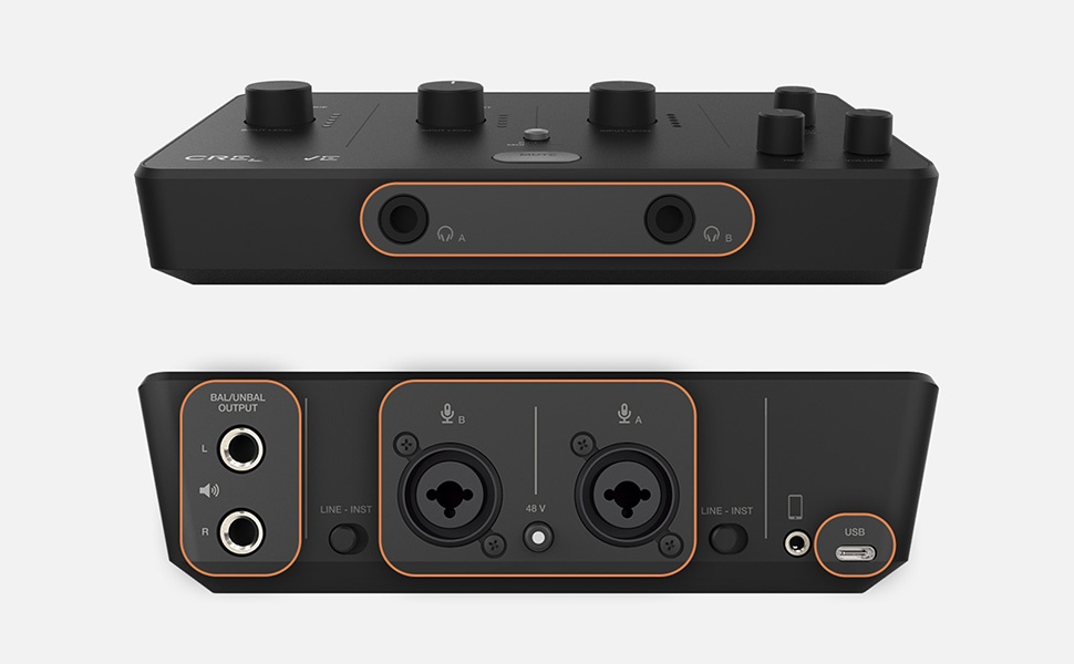 Audio interface device with multiple control knobs on top panel and various input/output ports including XLR and headphone connections on rear panel.
