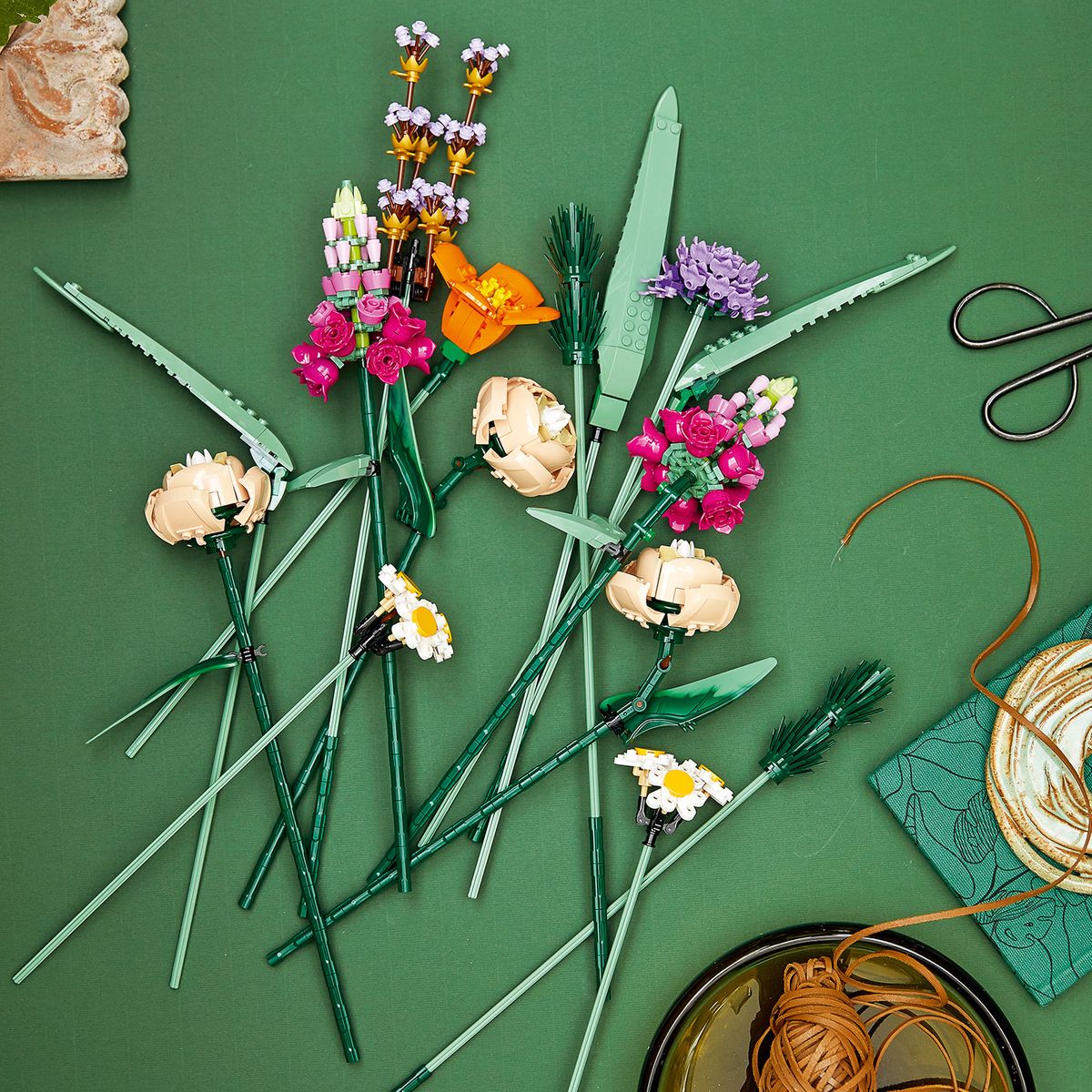 Close-up of LEGO roses, daisies, and asters