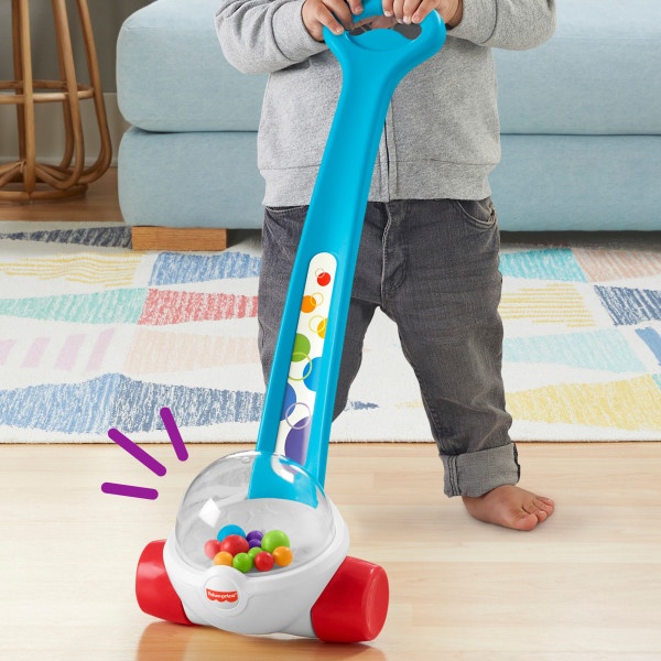 Robotic vacuum cleaner demonstration showing navigation around furniture legs and corners on a light floor surface.